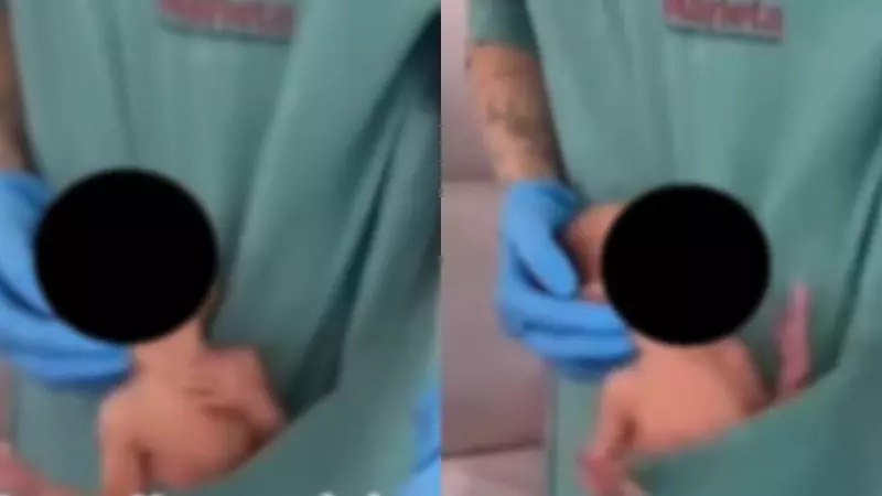 Funcionária do Hospital Marieta grava vídeo com recém nascido no bolso do uniforme